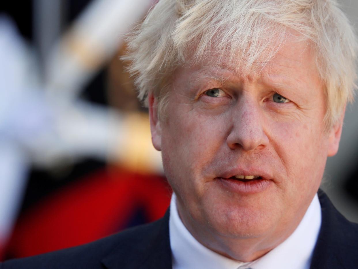 FILE PHOTO: British Prime Minister Boris Johnson delivers a joint statement with French President Emmanuel Macron (not seen) before a meeting on Brexit at the Elysee Palace in Paris, France, August 22, 2019. REUTERS/Gonzalo Fuentes/File Photo