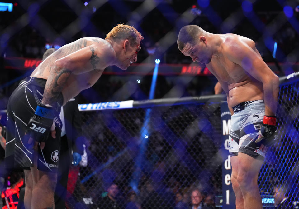 LAS VEGAS, NEVADA - SEPTEMBER 10: (R-L) Nate Diaz and Tony Ferguson pay each other respect after their welterweight fight during the UFC 279 event at T-Mobile Arena on September 10, 2022 in Las Vegas, Nevada. (Photo by Chris Unger/Zuffa LLC)