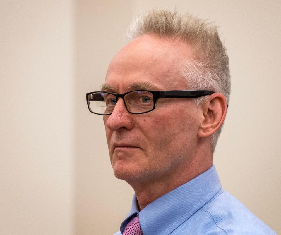 Steven M. Foley stands as the jury leaves the Worcester Superior Court room at the end of the second day of his murder trial on Tuesday.