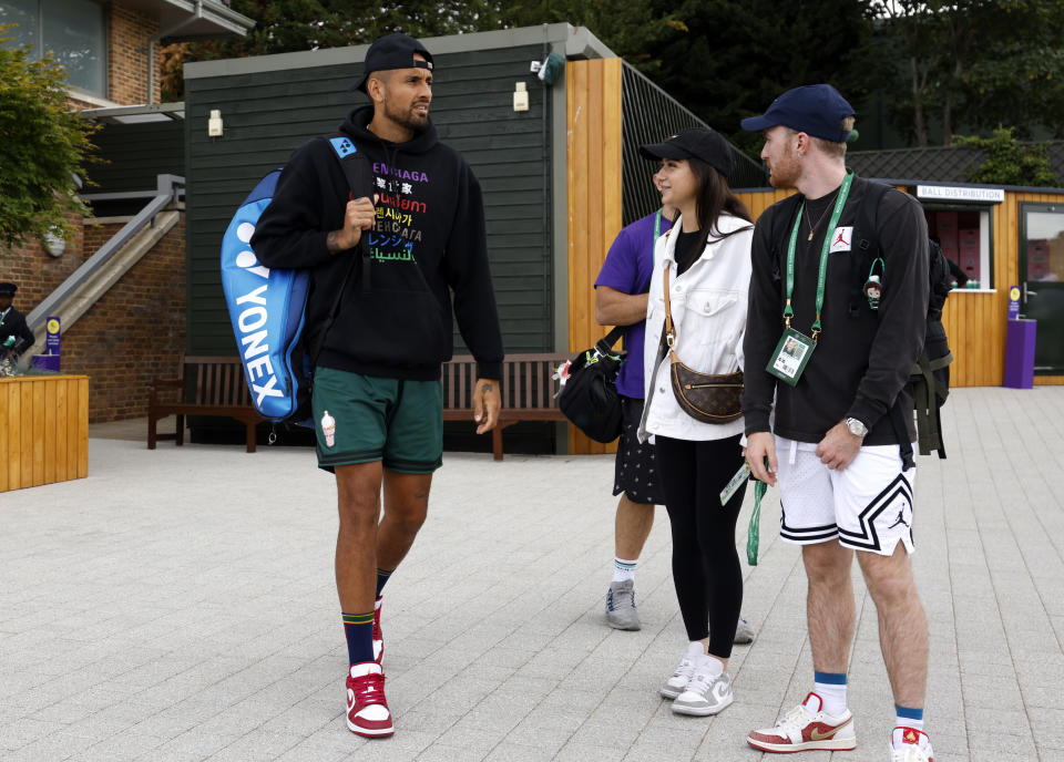 Nick Kyrgios, pictured here arriving at the practice courts at Wimbledon with this entourage.