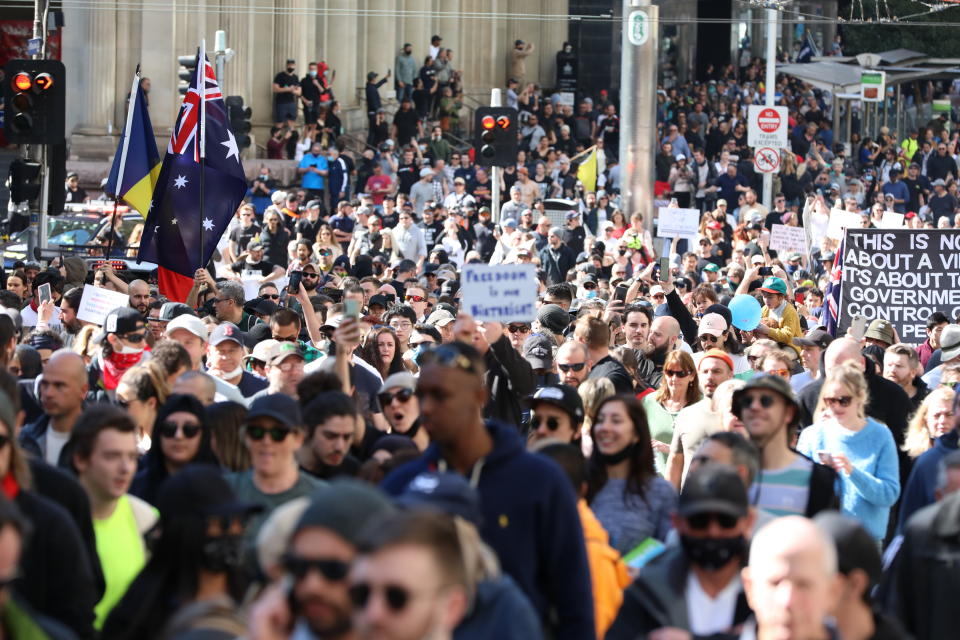 Thousands of people gather in Melbourne's CBD to protect lockdown restrictions on August 21, 2021 in Melbourne, Australia. Anti-lockdown protesters gathered despite current COVID-19 restrictions prohibiting outdoor gatherings. Lockdown restrictions are currently in place across Melbourne as Victoria continues to record new cases of the highly infectious COVID-19 Delta variant. A curfew is also now in place from 9 pm to 5 am each night across the metropolitan area. The restrictions are set to remain in place until 11.59 pm on Thursday, 2 September.