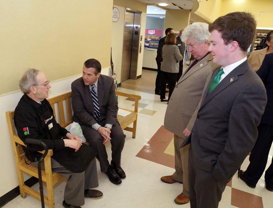 Brockton resident and longtime Stop & Shop employee Joel Tenenbaum, left, talks with, from center, Mayor Robert Sullivan, state Sen. Michael Brady and City Councilor Jack Lally, after the city and store announced the North Montello Street location would remain open. Tenenbaum has worked for Stop & Shop for 65 years, including the last 20 in Brockton.