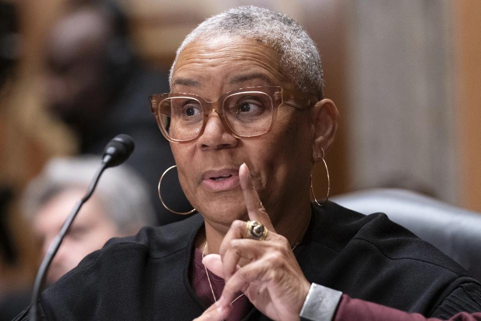 Brenda V. Smith, Professor of Law, American University Washington College of Law, testifies during the hearing of Senate Homeland Security and Governmental Affairs Subcommittee on Investigations, on Sexual Abuse of Female Inmates in Federal Prisons, on Capitol Hill in Washington, Tuesday, Dec. 13, 2022. (AP Photo/Jose Luis Magana)