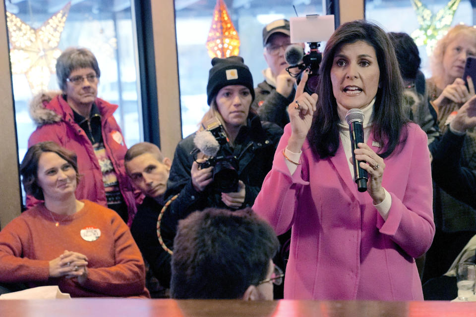 FILE - Republican presidential hopeful Nikki Haley speaks with supporters Jan. 15, 2024, in Des Moines, Iowa. The former South Carolina governor is the latest in a long line of women, historically some of Republican Donald Trump's most stubborn challengers, for whom the former president's playbook deploys intimidation, combined with a now-familiar brand of vulgarity, nicknames and other insults used for men, too. (AP Photo/Meg Kinnard, File)