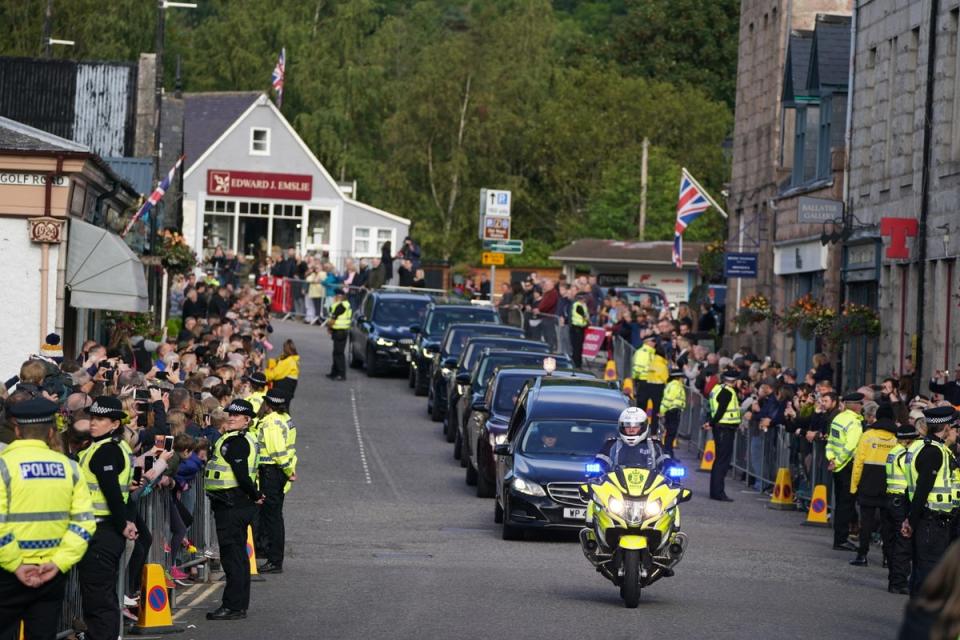 Crowds filled Ballater to pay their respects (Andrew Milligan/PA) (PA Wire)