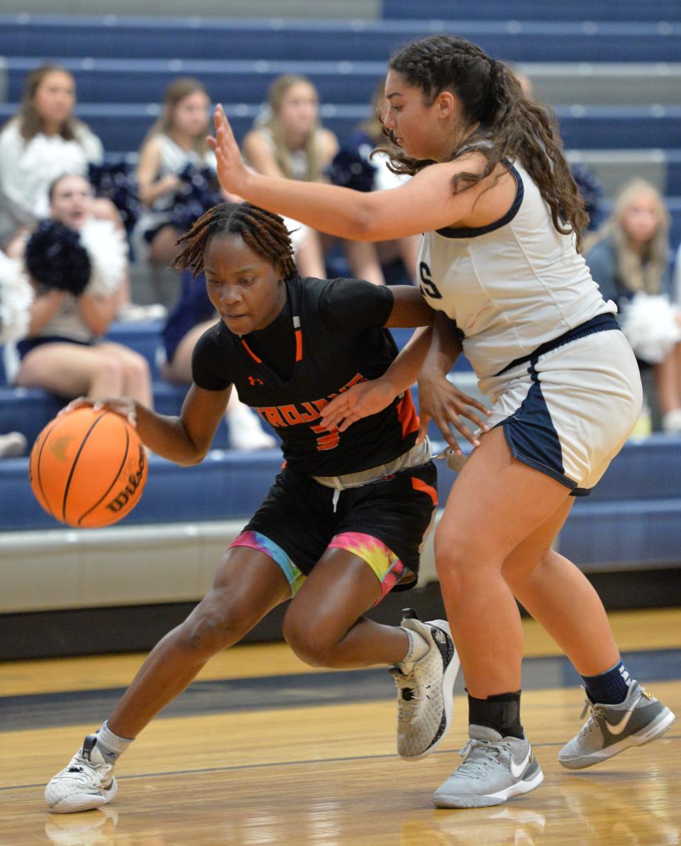 Lely's Jeade Leo (#3) is guarded by Parrish's Kaiyle Lacy (#24) . Parrish Community High School hosted Lely High School in the Class 5A Region 3 girls basketball playoff Monday night, Feb. 19, 2024
