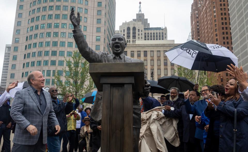 Mayor Mike Duggan smiles after helping unveil the Martin Luther King Jr. statue at Hart Plaza in Detroit on Friday, June 23, 2023. 