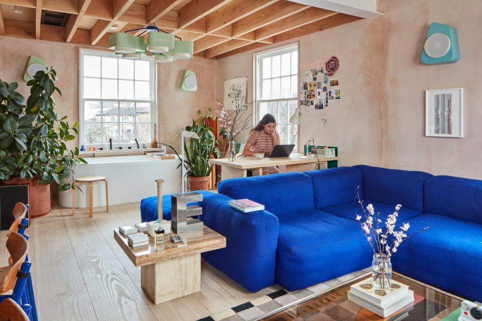 The bathroom was too small to incorporate a bath and a shower, so Holloway decided to put the bath in the open-plan kitchen/living room (Juliet Murphy)