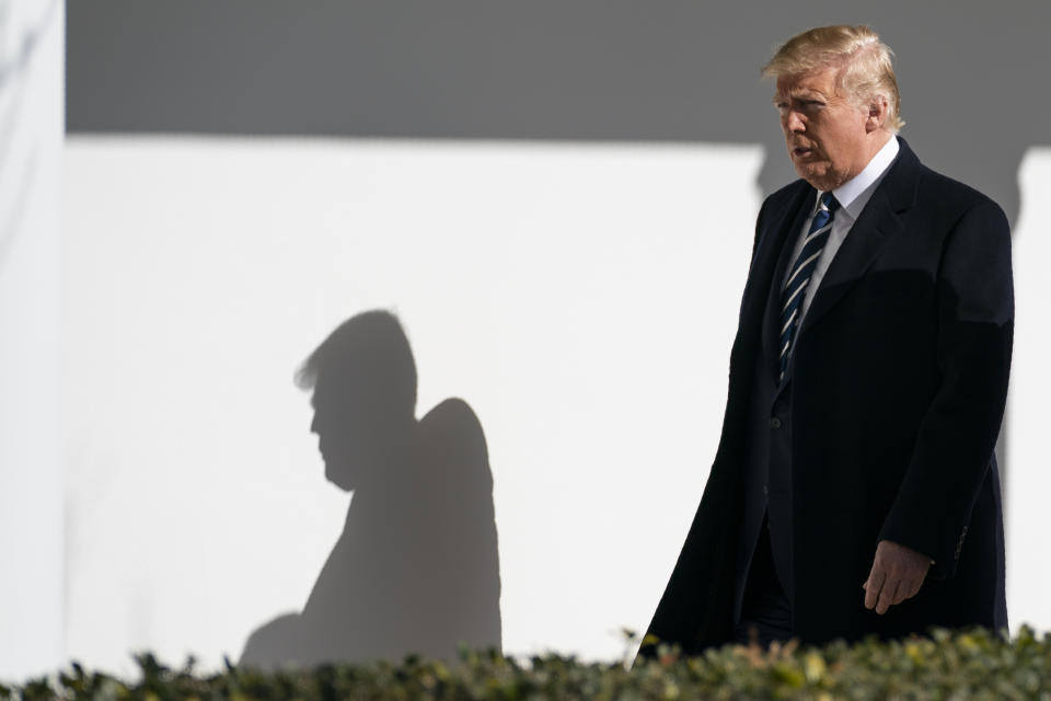 President Donald Trump walks to a meeting in the Oval Office of the White House with Israeli Prime Minister Benjamin Netanyahu, Monday, Jan. 27, 2020, in Washington. (AP Photo/ Evan Vucci)