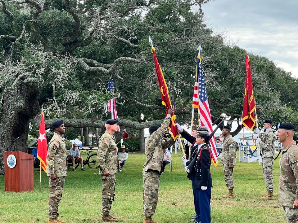 The Assumption of Command at Military Ocean Terminal Sunny Point is marked by the passing of the colors at a ceremony on the lawn at Fort Johnston in Southport on Tuesday, July 2, 2024.