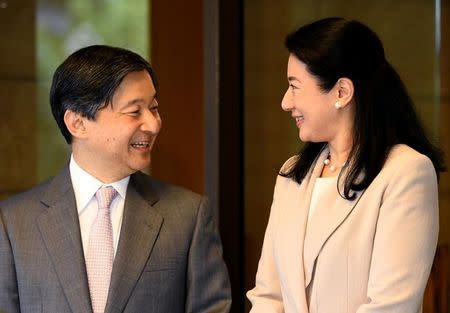 FILE PHOTO - Japanese Crown Prince Naruhito speaks with Crown Princess Masako prior to depart for his Brazil visit at Togu Palace in Tokyo, Japan March 16, 2018. Toshifumi Kitamura/Pool via Reuters