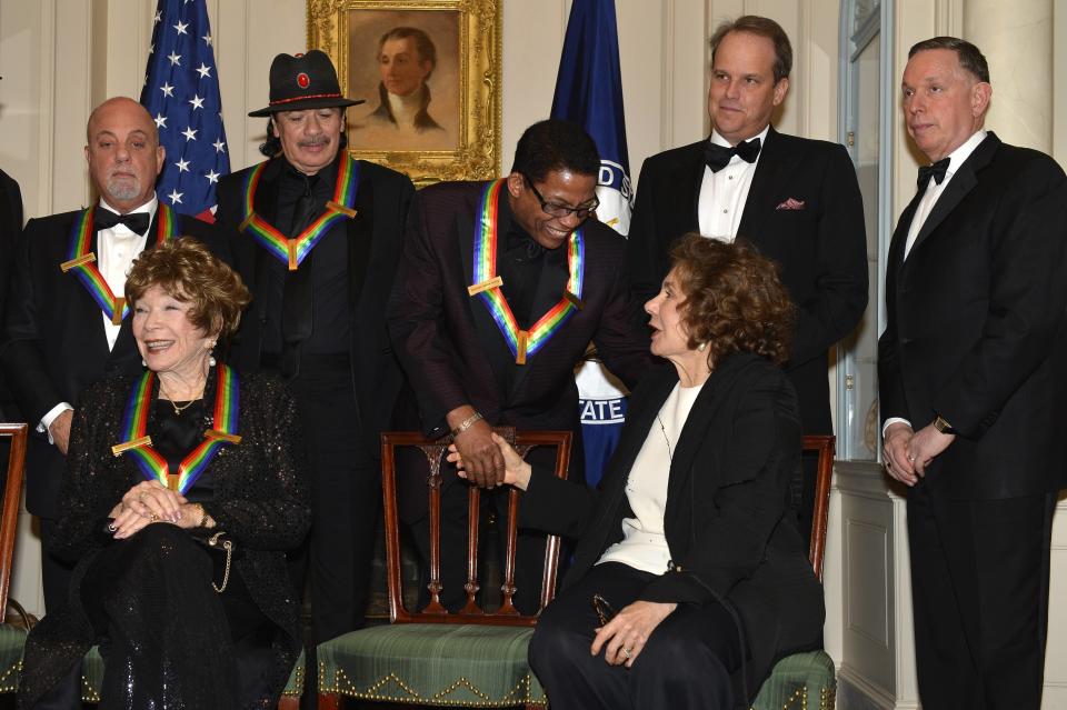 2013 Kennedy Center honorees gather prior to a group photo at the conclusion of a gala dinner at the US State Department in Washington