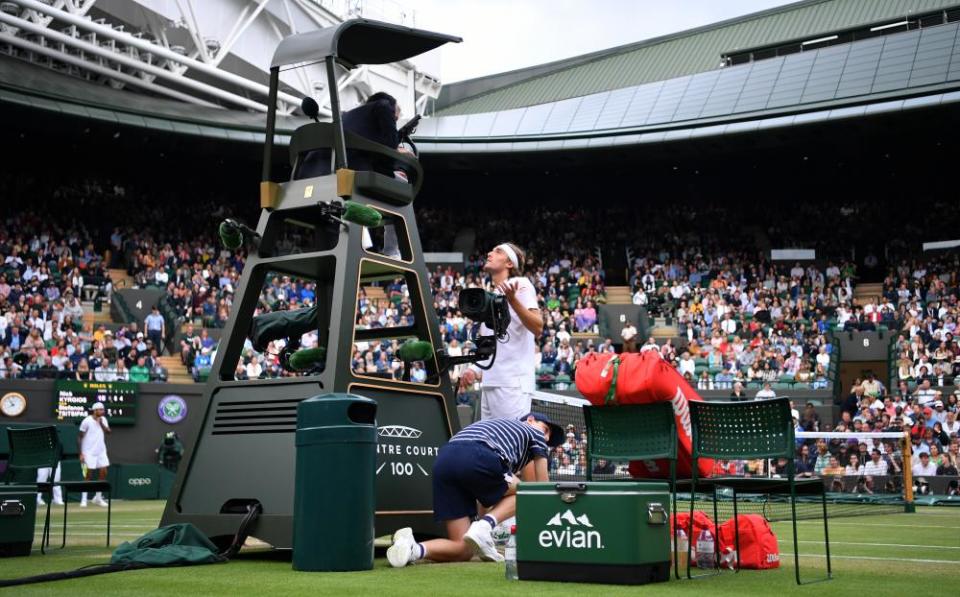 Stefanos Tsitsipas speaks with the umpire during the match