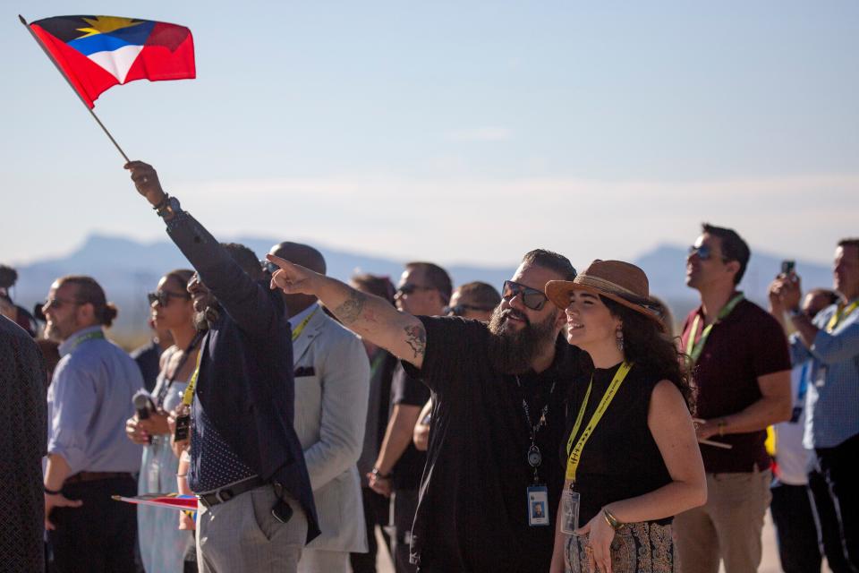 Spectators watch as the Virgin Spaceship Unity takes off on the runway during the Galactic 02 Launch on Thursday, August 10, 2023, at Spaceport America.