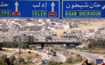 Road direction signs are pictured at the entrance enroute to Khan Sheikhoun, Idlib