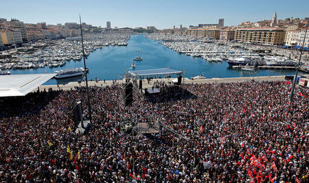 Supporters gather at the Old Harbour as Jean-Luc Melenchon of the French far left Parti de Gauche and candidate for the 2017 French presidential election delivers a speech during a political rally in Marseille, France, April 9, 2017. REUTERS/Jean-Paul Pelissier