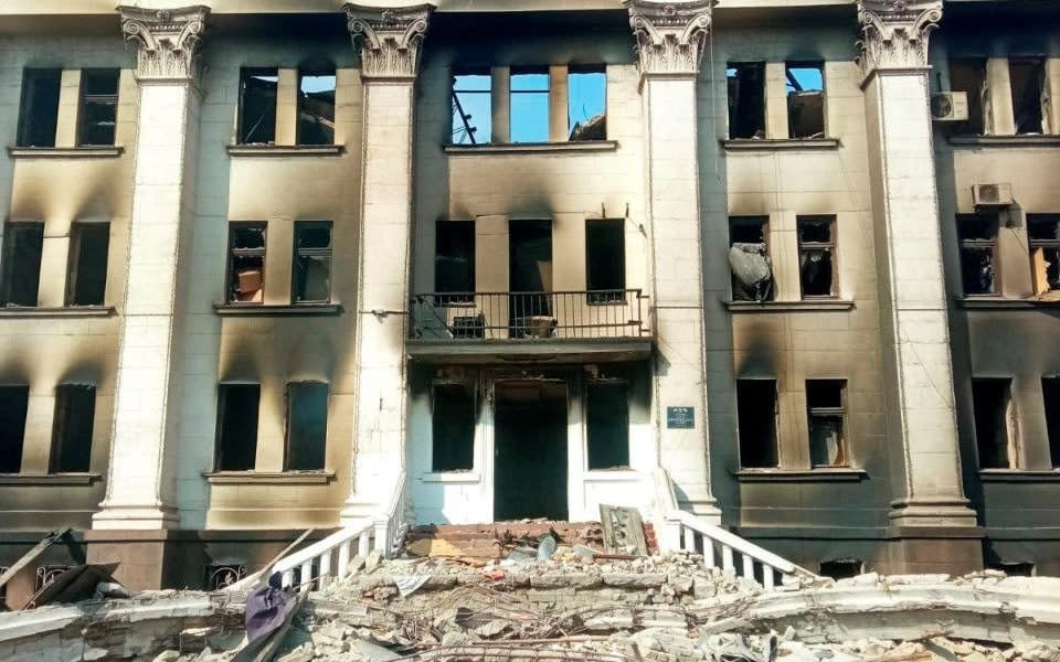 General view of the remains of the drama theatre which was hit by a bomb when hundreds of people were sheltering inside, amid ongoing Russia's invasion, in Mariupol, Ukraine, in this handout picture released March 18, 2022. - Azov Handout/ via REUTERS