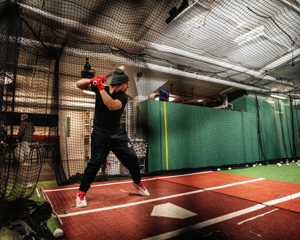 Boston Red Sox prospect Nick Yorke takes swings inside a batting cage at Fenway Park on Wednesday as part of the Red Sox Development Program.