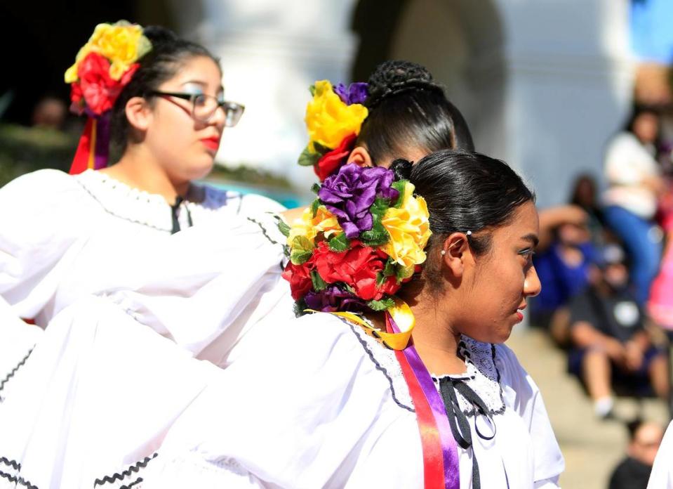 The Dia de los Muertos festival was held at the Mission Plaza on Saturday. The Forklorico women dancers wore elaborate headdresses.