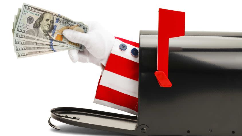 picture of Uncle Sam&#39;s arm sticking out of a mailbox and holding cash