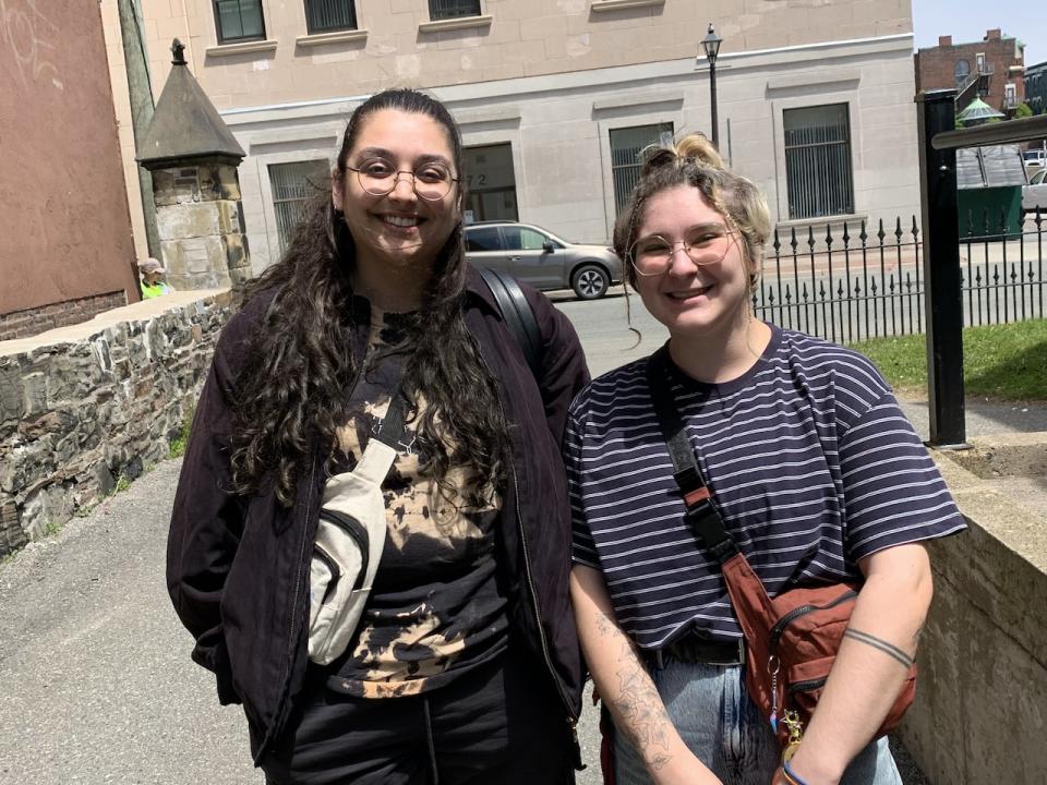 Manny Travers (right), attending the meeting on behalf of Third Space art gallery, says the timing of the construction poses problems for the gallery's annual outdoor art festival in August because Charlotte St. was supposed to be one of the main areas of the festival.