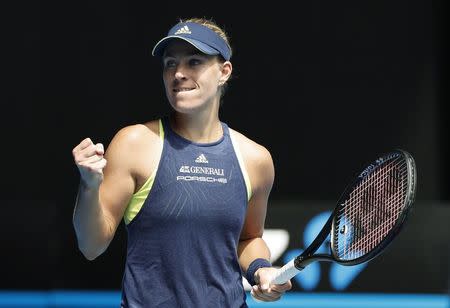 Tennis - Australian Open - Quarterfinals - Rod Laver Arena, Melbourne, Australia, January 24, 2018. Angelique Kerber of Germany celebrates winning against Madison Keys of the U.S. REUTERS/Issei Kato