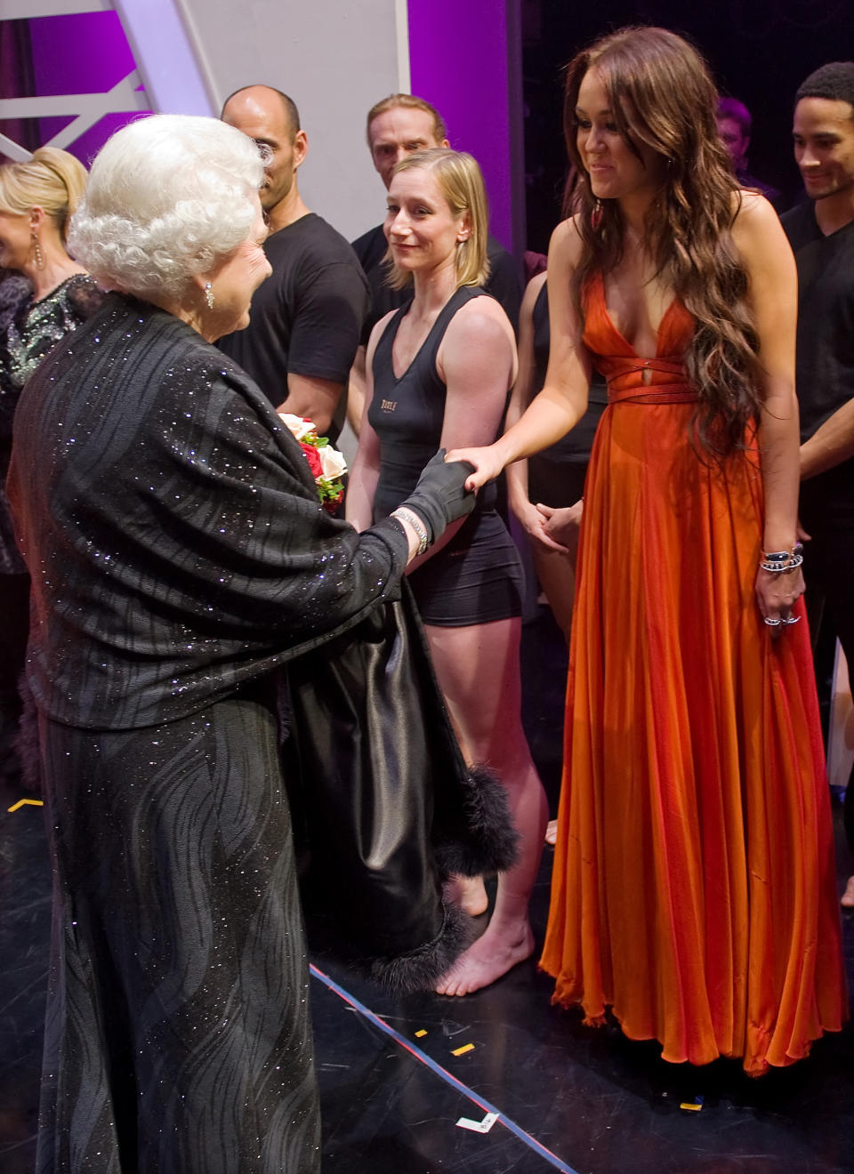 Queen Elizabeth II meets Miley Cyrus in 2009 (AFP via Getty Images)