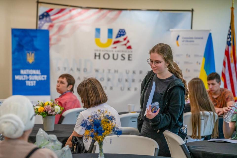 Anna Vishnina, 17, returns after completing her National Multi-subject Test for Ukrainian refugee high school graduates seeking to further their educational goals on Tuesday. “I will definitely visit Ukraine again, I’m really missing it. I think it won’t just be a work trip but something important to my soul and my heart,” she said.