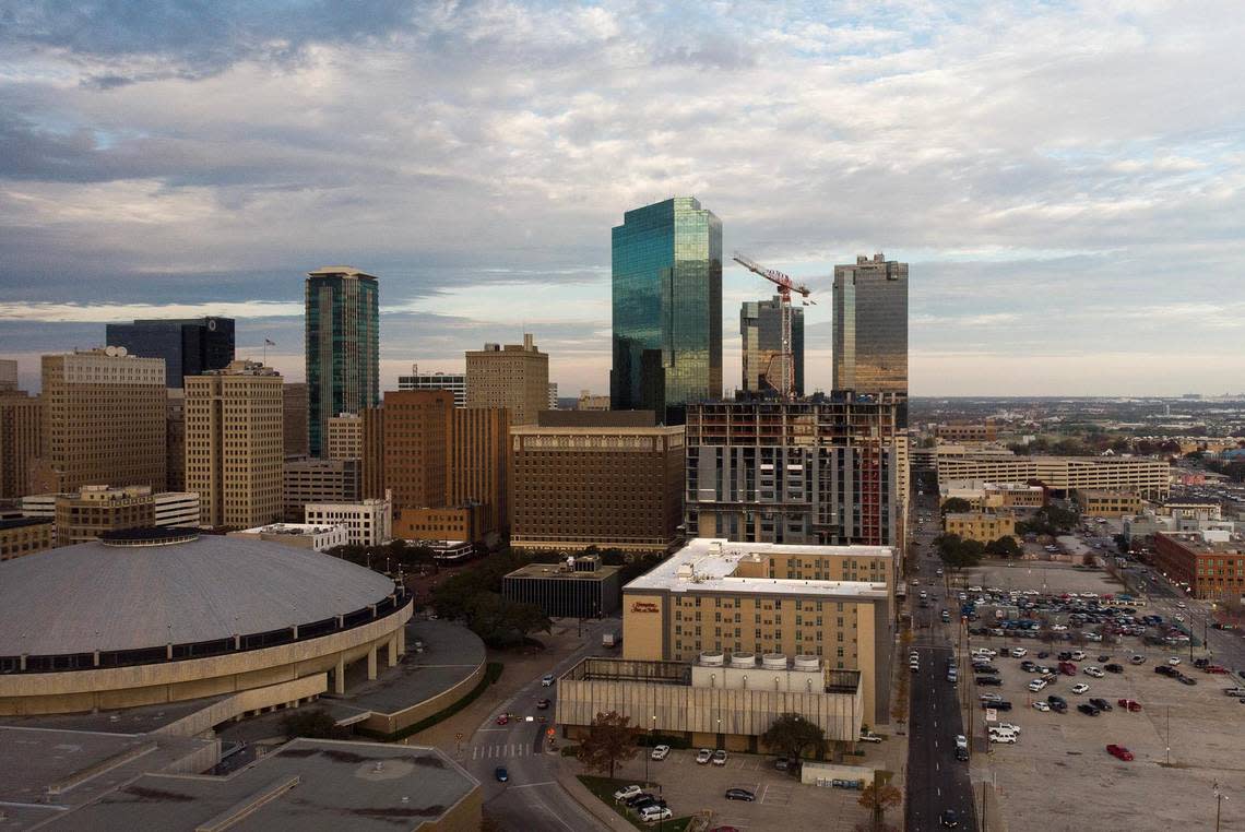 A crane can be seen atop what will be Deco 969, Fort Worth’s first new-build residential high-rise, on Tuesday, December 6, 2022. Deco 969 will have 27 stories of luxury apartments.