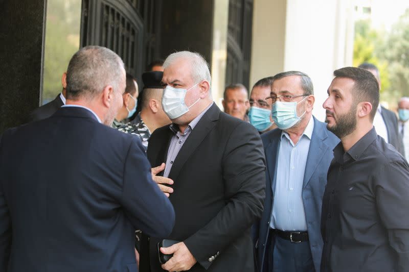 Head of Hezbollah's parliamentary bloc Mohamed Raad, accompanied by his parliamentary bloc, arrives to attend a parliamentary session at UNESCO Palace in Beirut