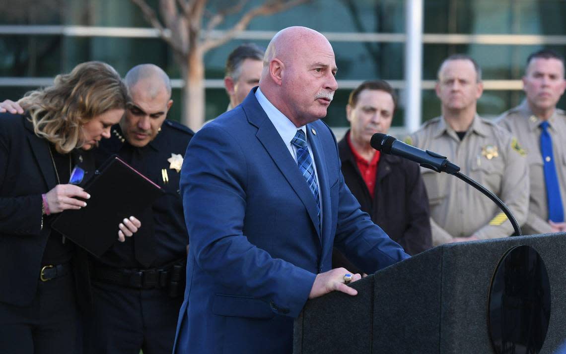 Fresno Mayor Jerry Dyer, addresses the media with District Attorney Lisa Smittcamp, far left, leaning in to talk to Fresno Police Chief Paco Balderrama at a press conference Friday Jan. 27, 2023 outside Fresno City Hal. Local clergy, city officials and representatives of law enforcement addressed the release of Memphis police video in the arrest of Tyre Nichols, urging people to remain calm and protest peacefully.