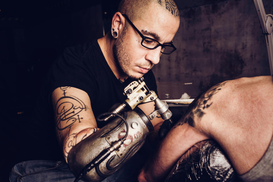 The first prosthetic tattoo gun arm