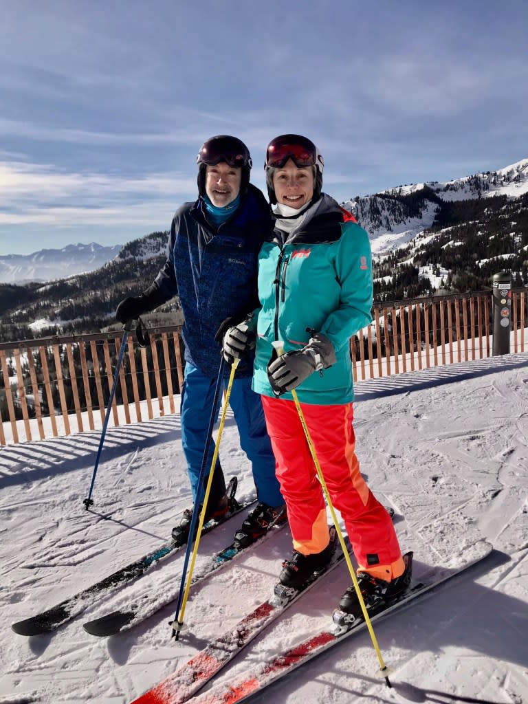 Photo of Renee Stanton and her husband, Trey Slough, skiing.