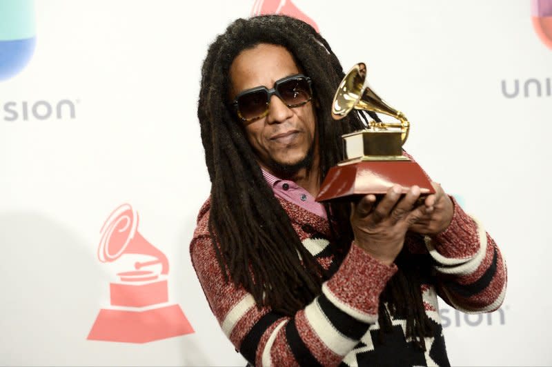 Tego Calderon poses in the pressroom with the award for Best Urban Music Album for El Que Sabe, Sabe during the 16th Annual Latin Grammy Awards at the MGM Grand Garden Arena in Las Vegas in 2015. File Photo by Jim Ruymen/UPI