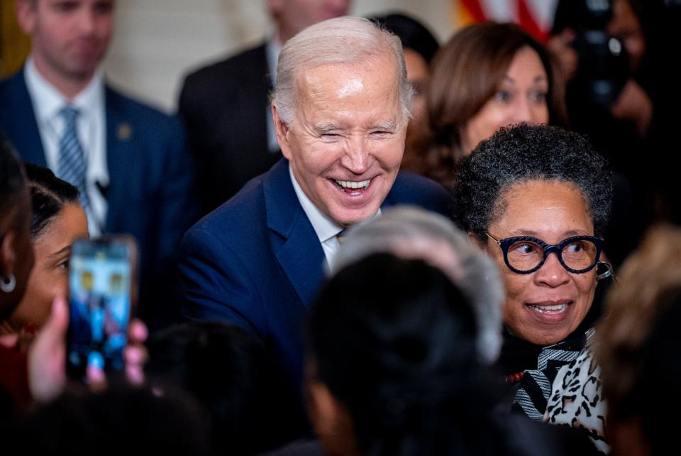 President Joe Biden greet members of the audience during a reception in recognition of Black History Month in the East Room of the White House in Washington, Tuesday, Feb. 6, 2024.