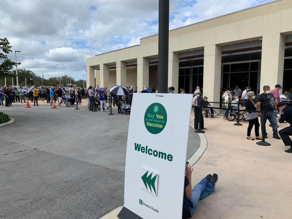 On the first day Baptist Health began administering the COVID-19 vaccination, lines formed at the site on the Hilton grounds on the hospital’s Kendall campus on Jan. 11, 2021.