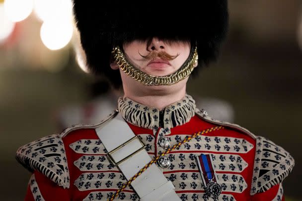 PHOTO: A member of the military marches on The Mall, in central London, early Wednesday, May 3, 2023, during a full-dress rehearsal for the Coronation of King Charles III. (Andreea Alexandru/AP)