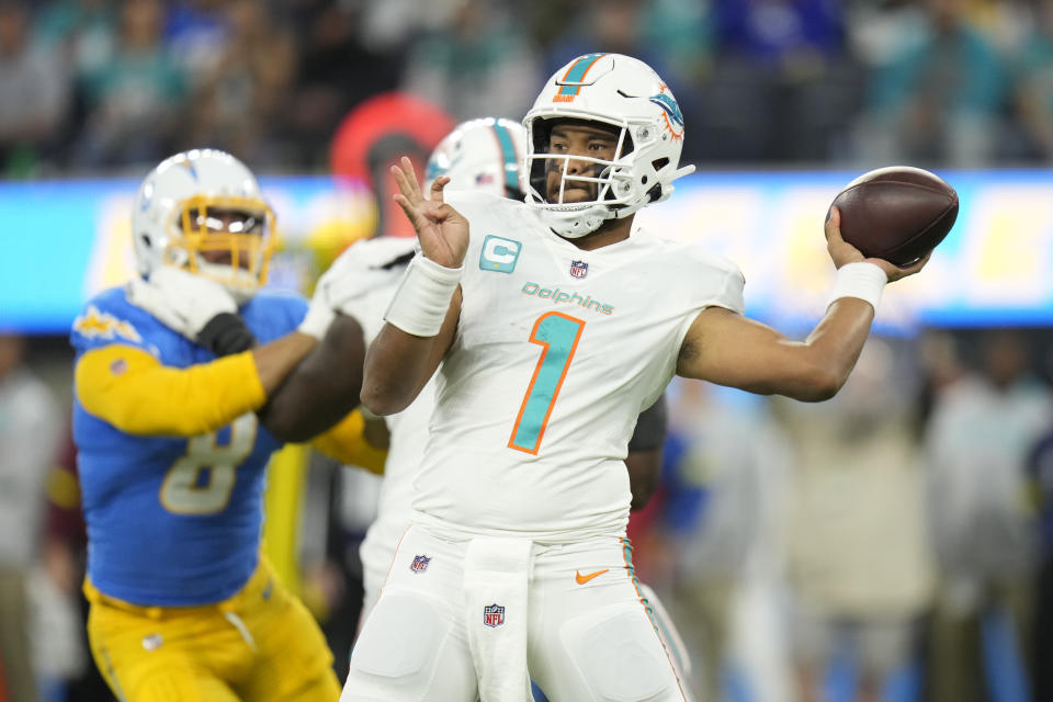 Miami Dolphins quarterback Tua Tagovailoa (1) throws during the first half of an NFL football game Los Angeles Chargers Sunday, Dec. 11, 2022, in Inglewood, Calif. (AP Photo/Jae C. Hong)