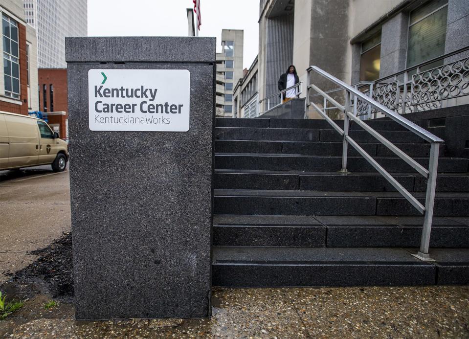 Keith Reeves Sr. walked out of the Kentucky Career Center at 600 Cedar St. Wednesday, March 18, 2020. The office was shut down, but he received information on how to apply for unemployment benefits online.