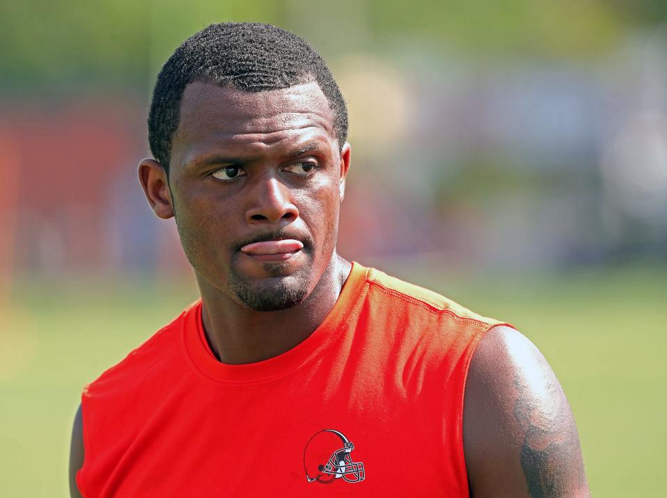 Cleveland Browns quarterback Deshaun Watson comes off the field after practice during the NFL football team's football training camp in Berea on Aug. 4, 2022.