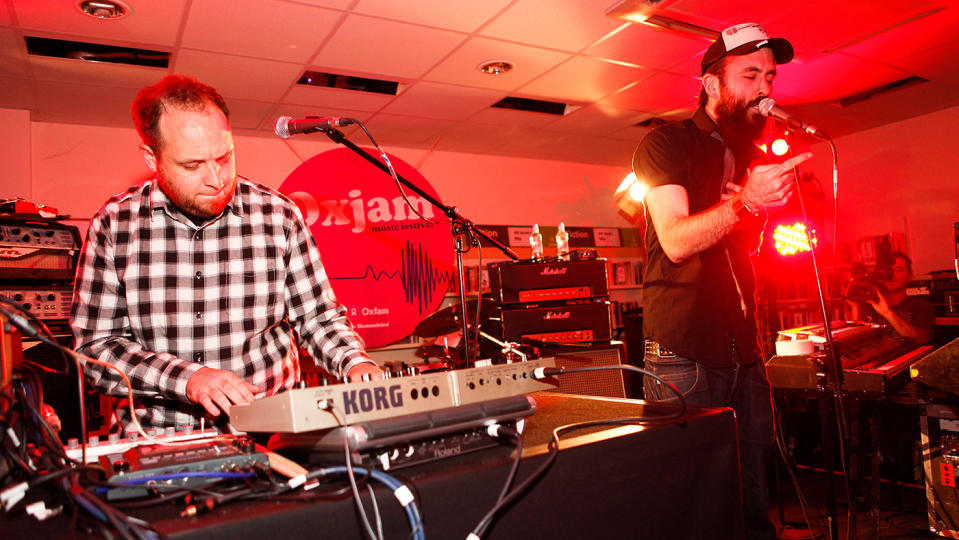 Dan Le Sac vs Scroobius Pip perform at launch of nationwide music festival 'Oxjam' at Dalston Oxfam Shop in 2010