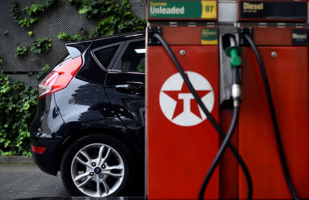 Fuel pumps are seen at a Texaco petrol station in London, Britain, July 26, 2017. REUTERS/Hannah McKay