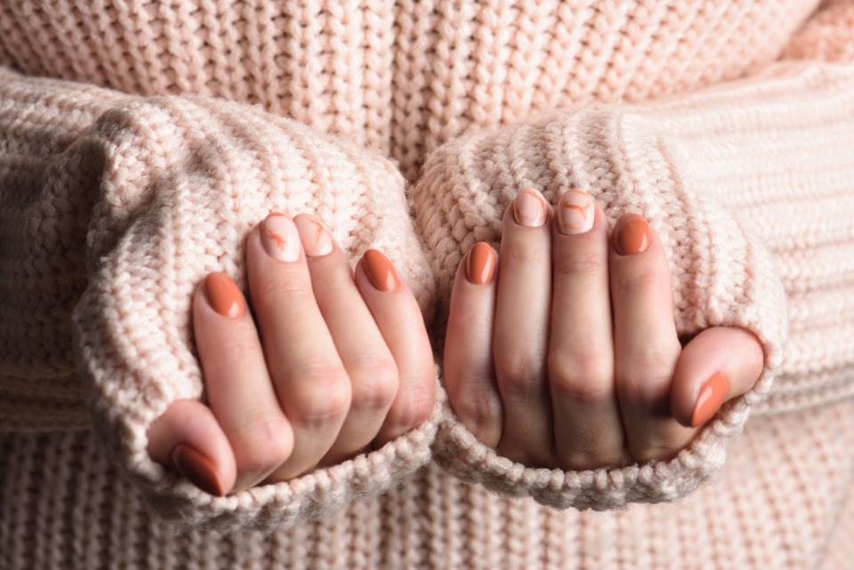 5) Orange Marble Nails