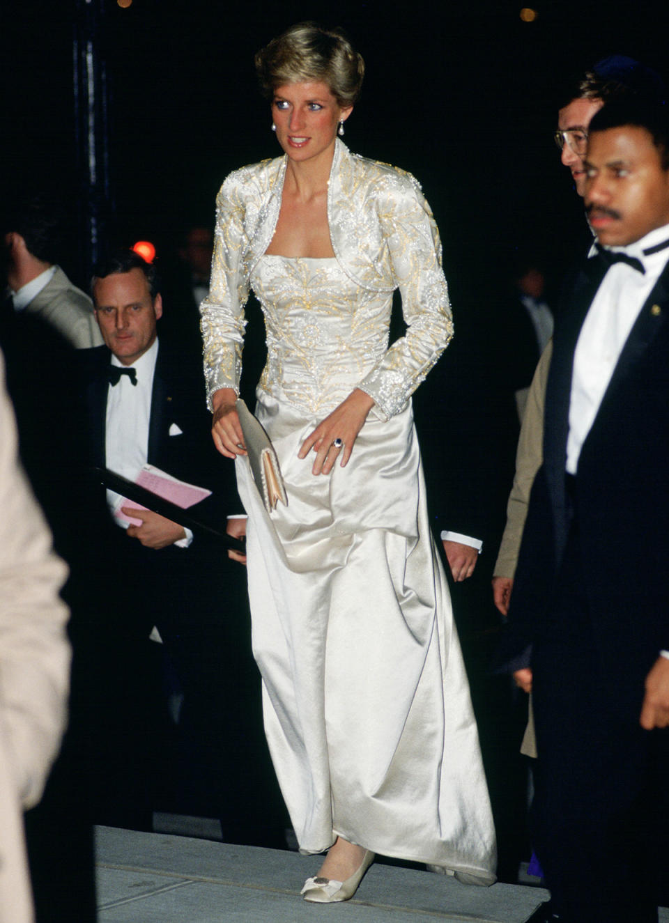 <p>"When Diana entered the box, radiant in a magnificent long white dress with a matching bolero jacket covered in jewels, a gasp went up from the crowd," Karen Brooks Hopkins, President Emerita of BAM, told PEOPLE of <a href="https://people.com/royals/princess-diana-new-york-city-opera-night-recreated-the-crown-first-hand-account/" rel="nofollow noopener" target="_blank" data-ylk="slk:Princess Diana's 1989 trip to the opera;elm:context_link;itc:0;sec:content-canvas" class="link ">Princess Diana's 1989 trip to the opera</a> while visiting N.Y.C. in 1989. </p>