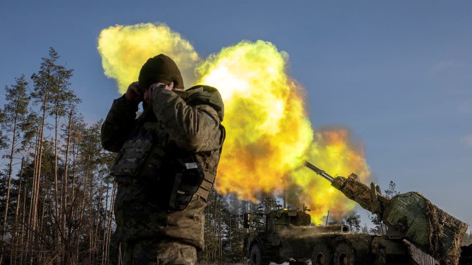 A Ukrainian serviceman fires a Swedish-made howitzer at Russian positions in the Donetsk region, in December. - Thomas Peter/Reuters