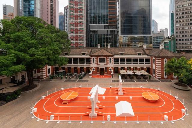 Hermès Launches All-Orange Space With Branded Boxing Ring, Kettlebells and  More