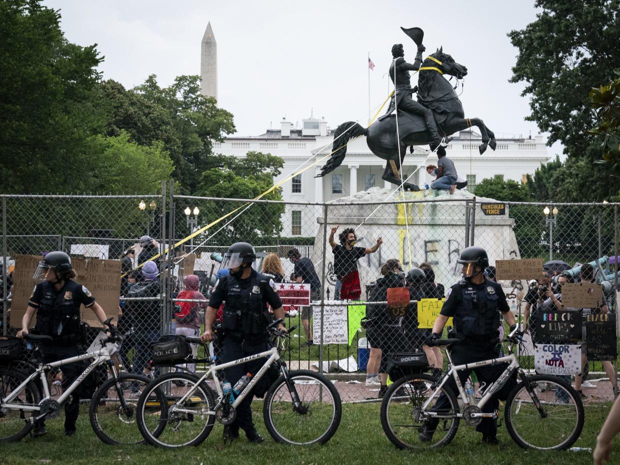Protesters attempt to pull down the statue of Andrew Jackson in Lafayette Square near the White House on June 22, 2020, in Washington, D.C. Protests continue around the country over police brutality, racial injustice and the deaths of African Americans while in police custody.