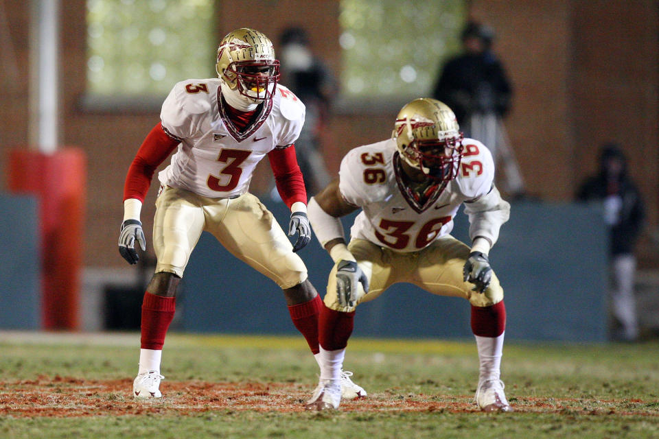 COLLEGE PARK, MD - NOVEMBER 22:  Myron Rolle #3 and Dekoda Watson #36 of the Florida State Seminoles defend against the Maryland Terrapins on November 22, 2008 at Byrd Stadium in College Park, Maryland.  (Photo by Jim McIsaac/Getty Images)