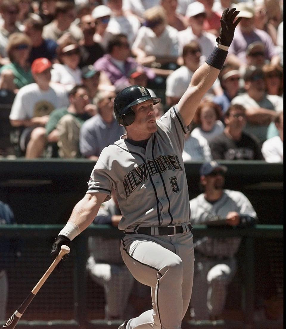 Milwaukee Brewers GeOff Jenkins watches as his three-run homer sails over the right field wall during the first inning against the Colorado Rockies at Coors Field in Denver Saturday, May 16, 1998.