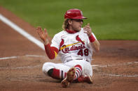 St. Louis Cardinals' Harrison Bader celebrates after scoring during the third inning in the second game of a baseball doubleheader against the Minnesota Twins Tuesday, Sept. 8, 2020, in St. Louis. (AP Photo/Jeff Roberson)